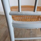 Low chair in wood and canework