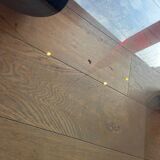 Gae Aulenti coffee table for Fontana Arte, transparent glass top with black cast iron supports, 1980s.