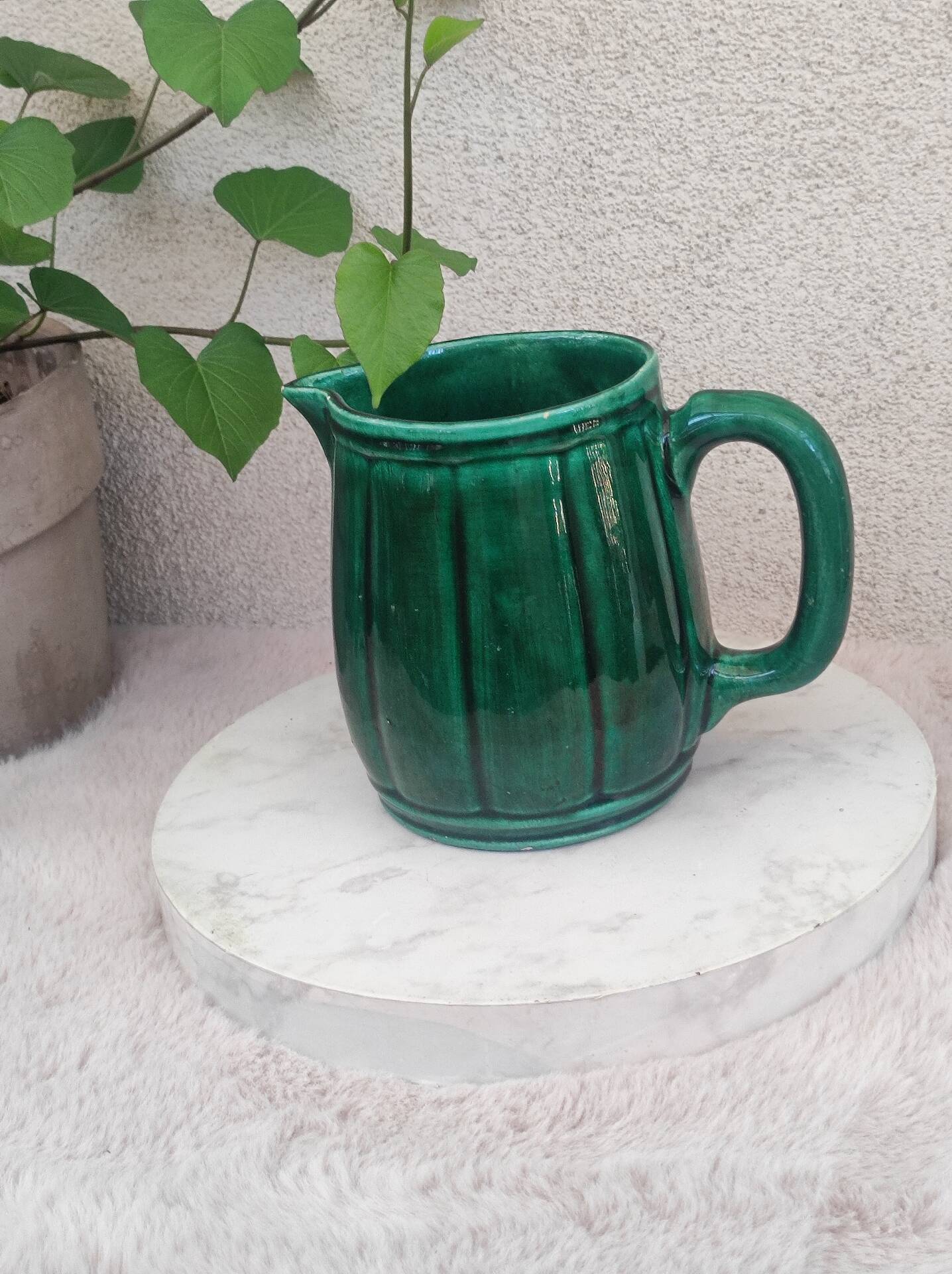 Old green jug