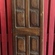 France old 18th century walnut closet door. Composed of 8 finely carved panels.