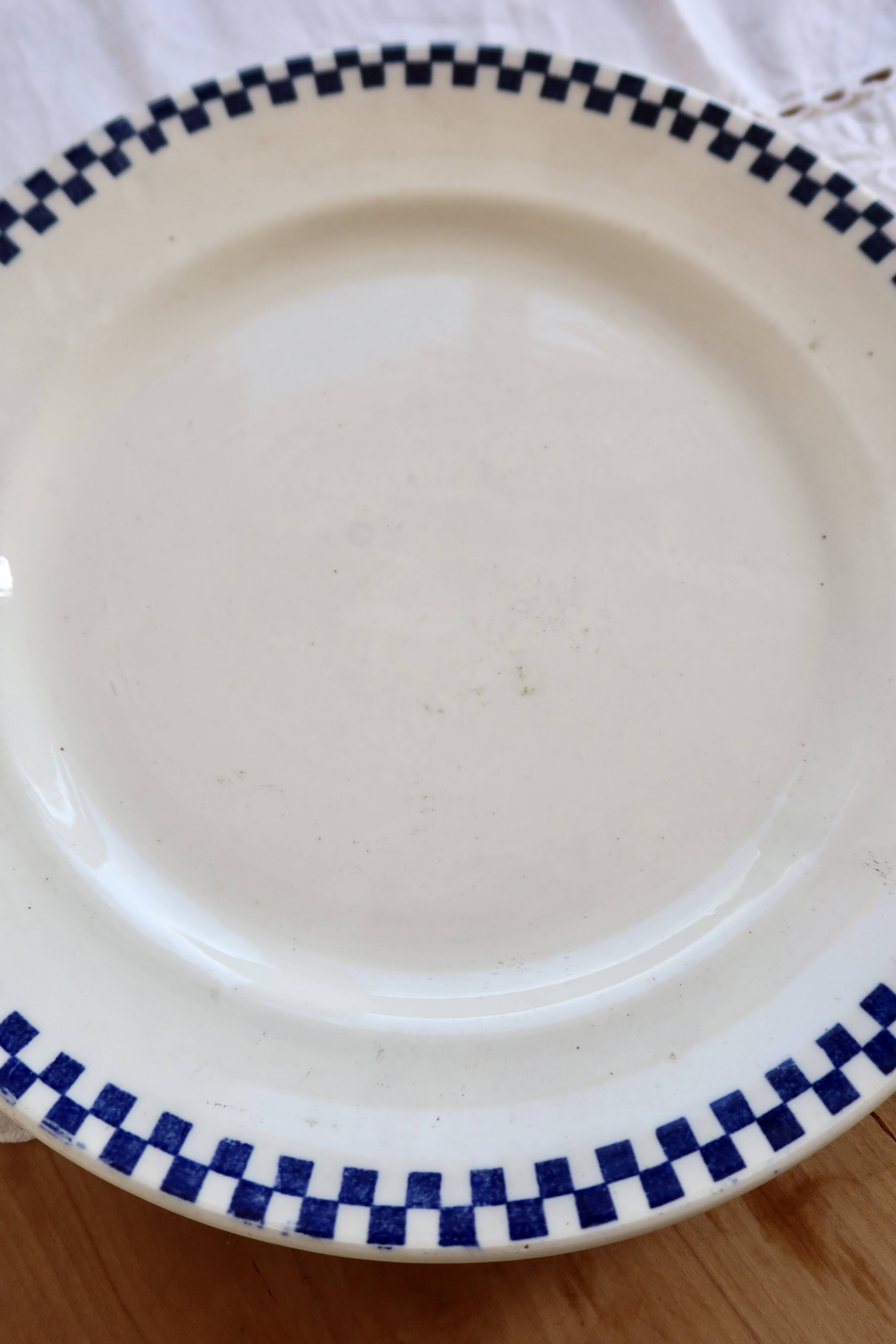 Round serving dish, old ironstone from Salins - Checkerboard pattern