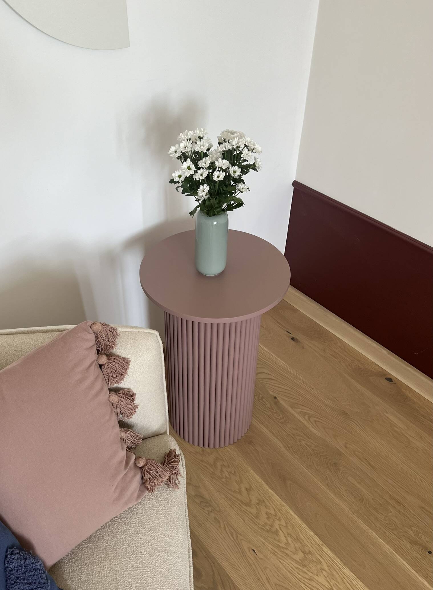 round and fluted side table in mauve, dimmed pink purple