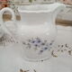 Vintage 15-piece coffee set in white porcelain Bavaria with small blue flowers