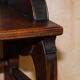 Antique entrance bench by Jas Shoolbred with brass fittings and walnut frame circa 1890.