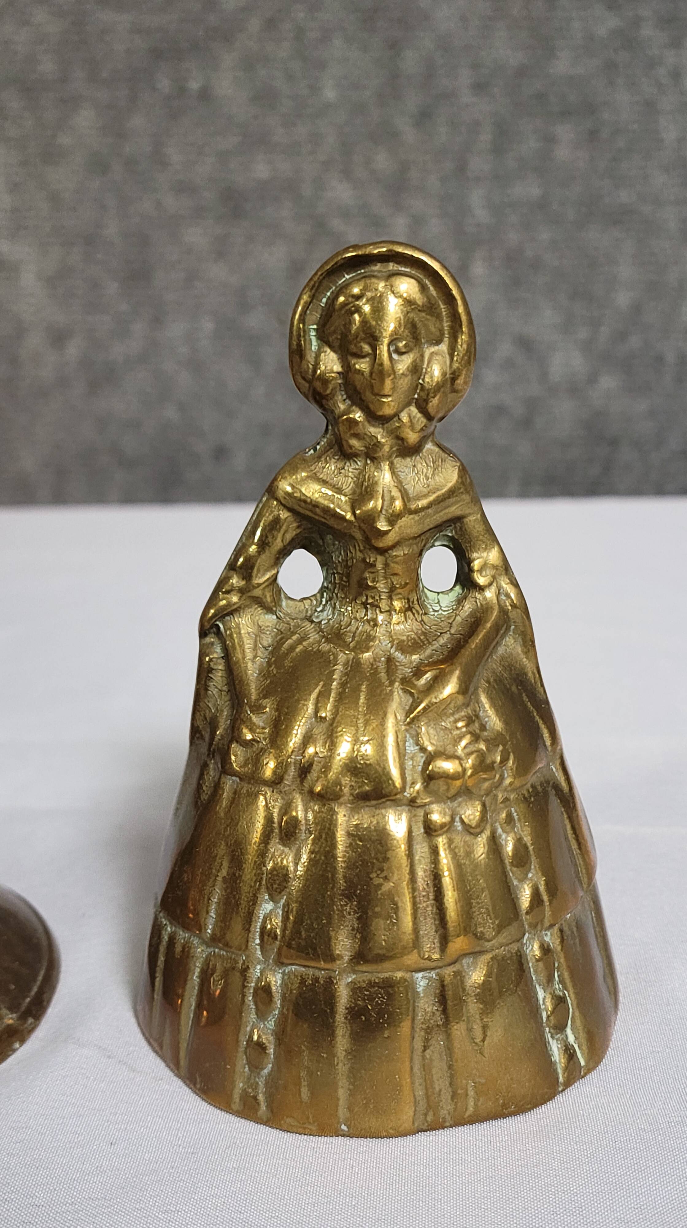 Two vintage bronze table cloches, finely chiseled and gilded