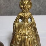 Two vintage bronze table cloches, finely chiseled and gilded