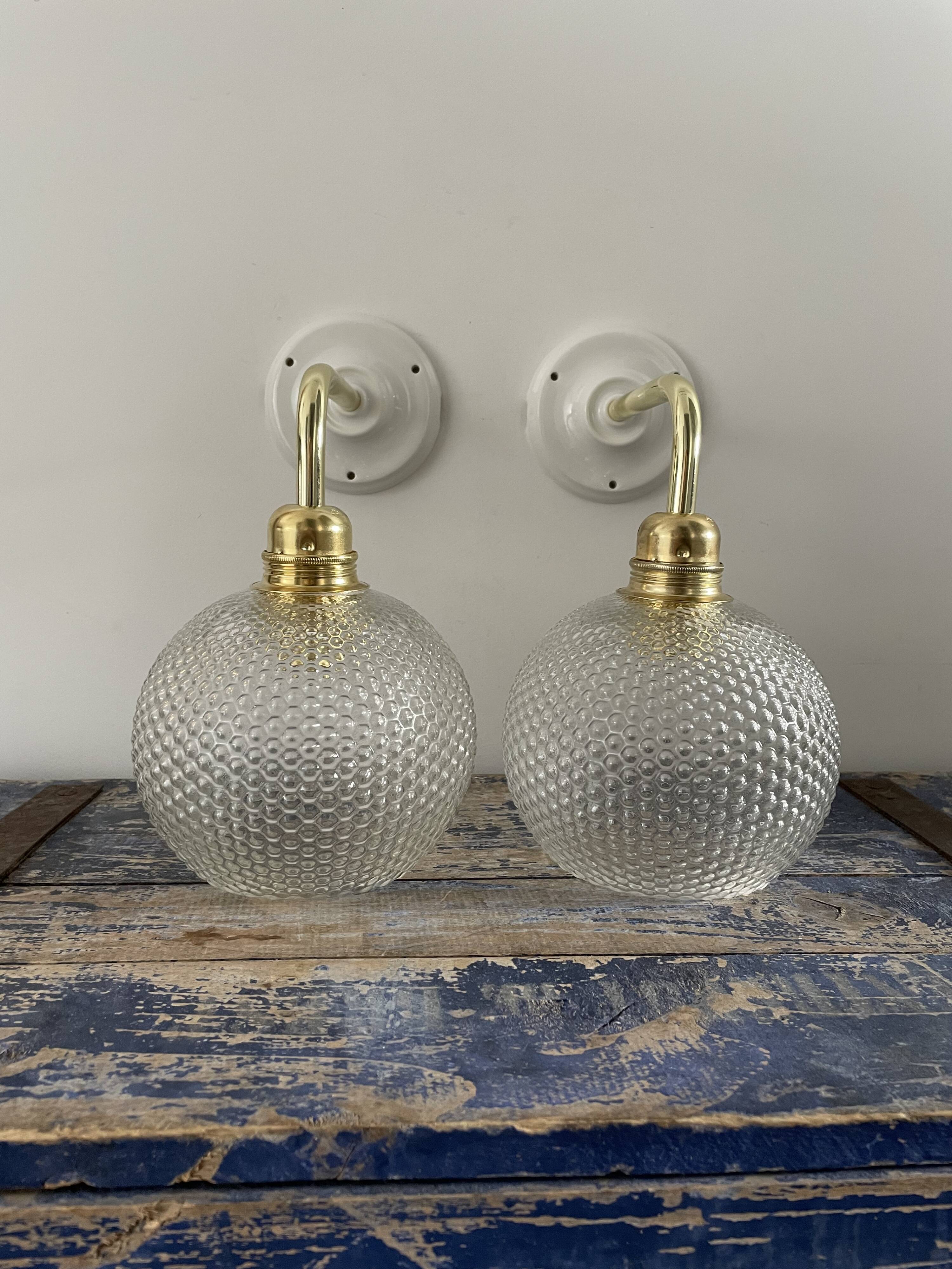 Pair of wall sconces glass globes