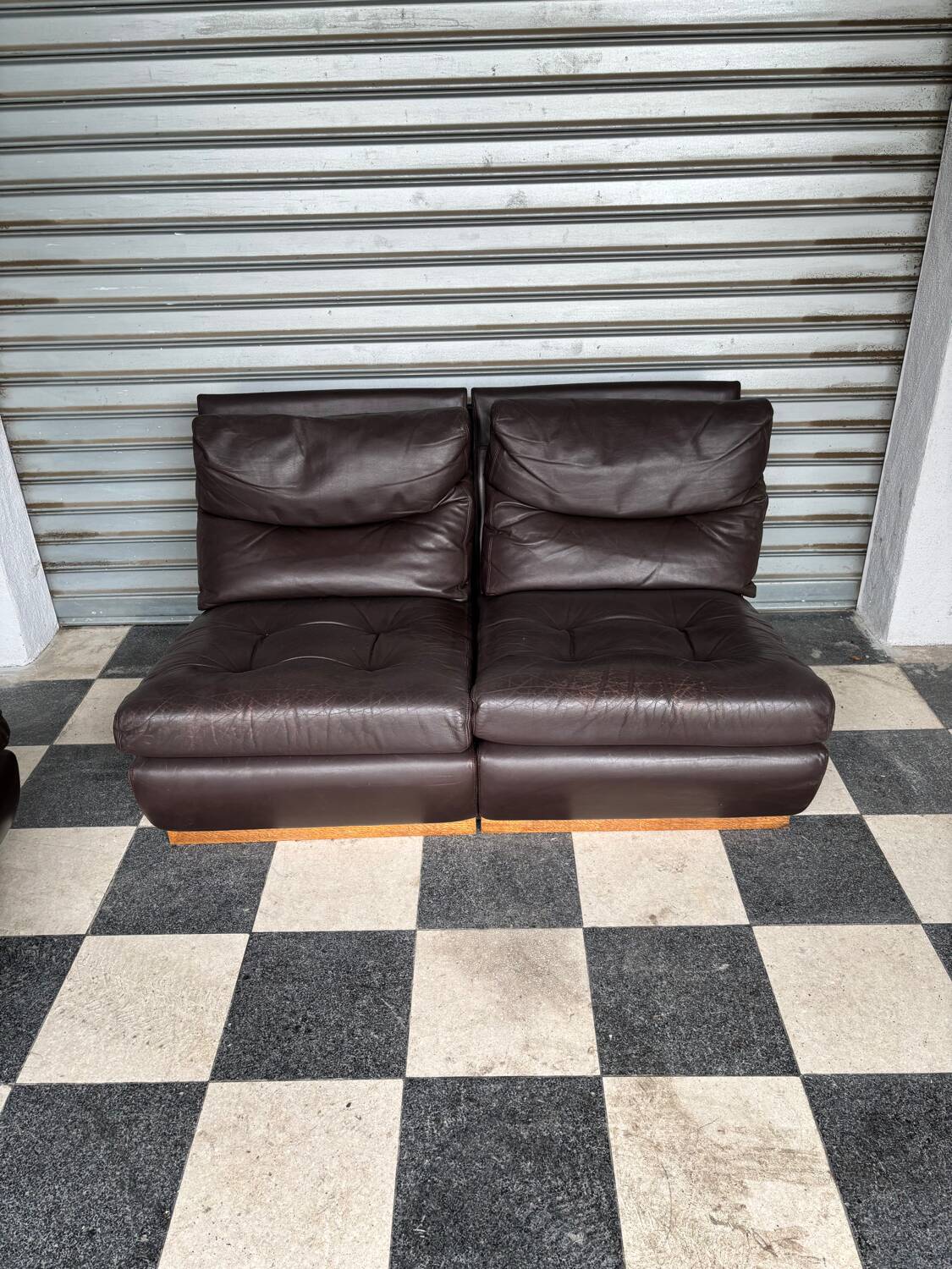 Pair of Roche Bobois leather armchairs