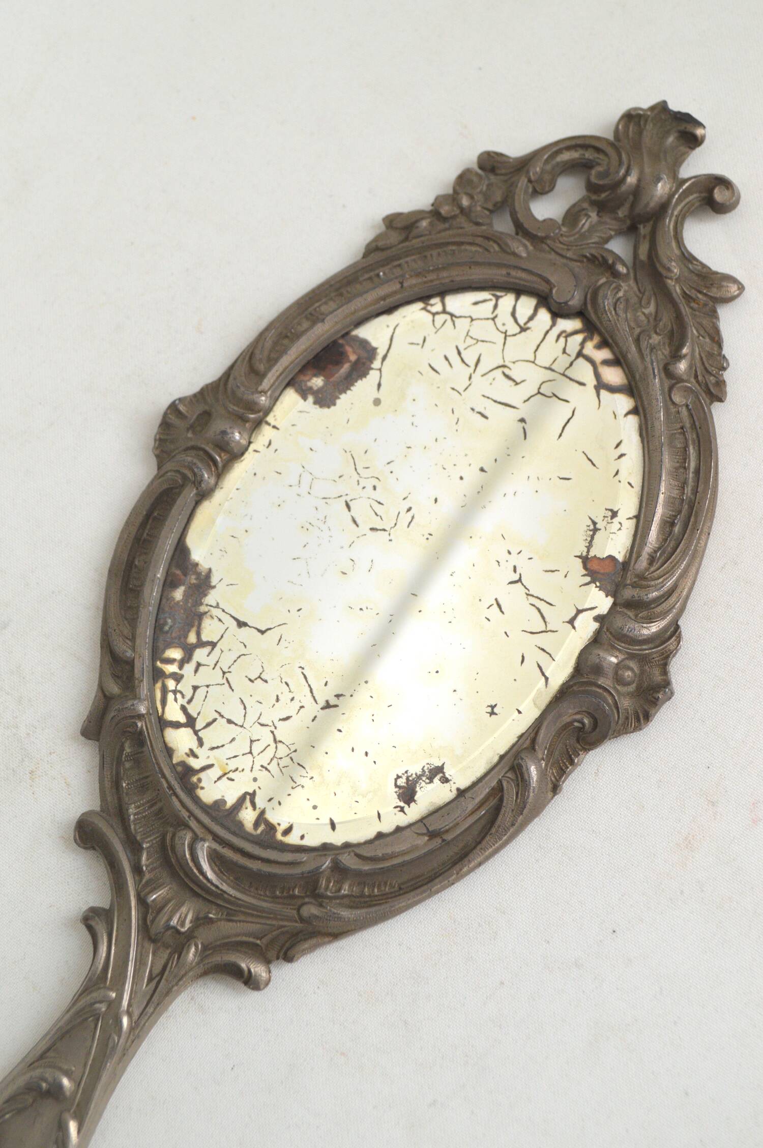 Pewter hand mirror