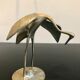 Couple of brass birds