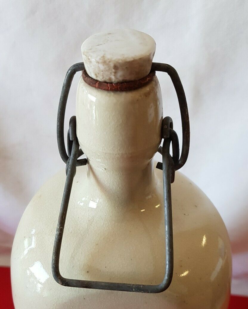 Bouteille en grès vernisse avec bouchon porcelaine