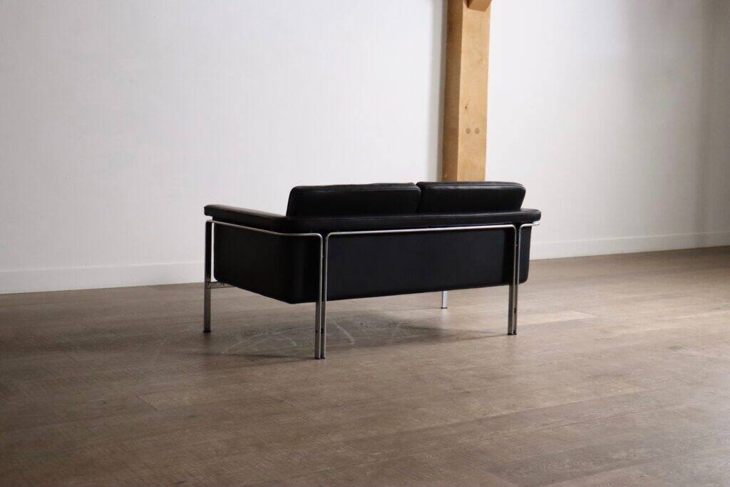 Horst Brüning Model 6912 two seater sofa in black leather for Kill International, Germany 1967