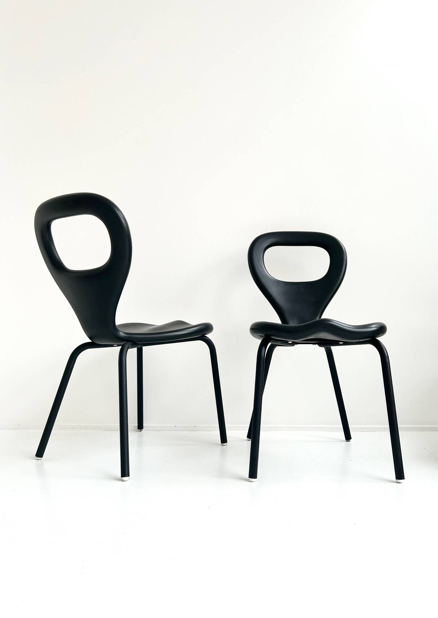 Pair of "TV chairs" by Marc Newson for Moroso 1993