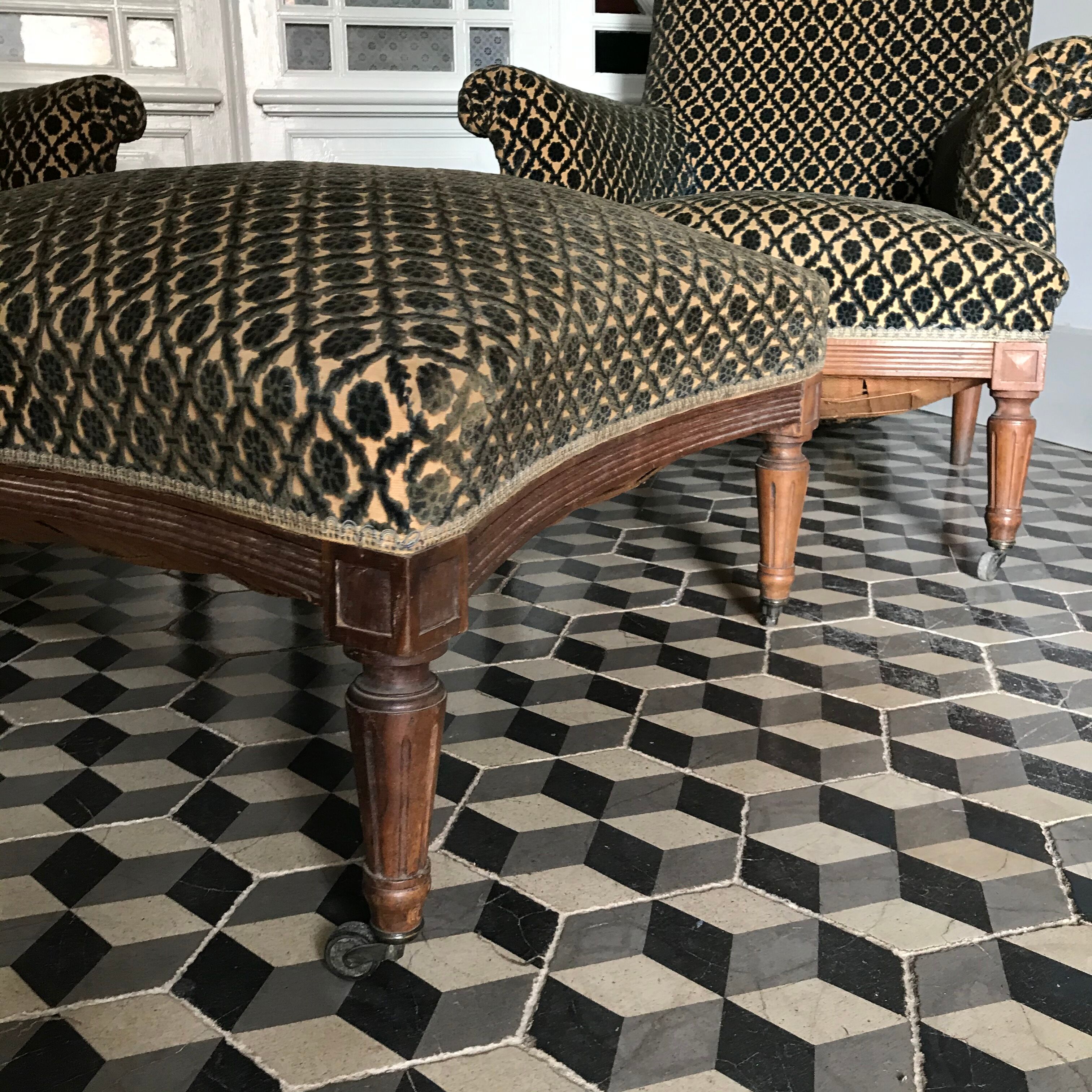Vintage armchairs and rests feet