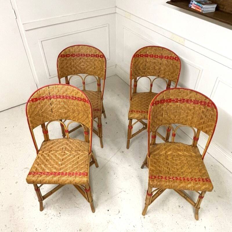 Set of 4 antique chairs in woven red and natural rattan.