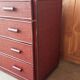 Vintage red lacquered rattan chest of drawers