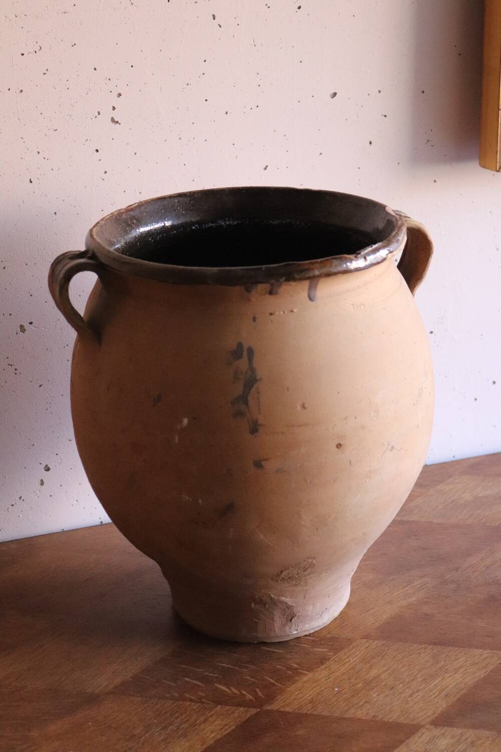 Old glazed terracotta olive jar