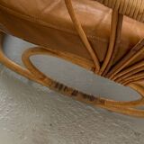 Pair of leather and bamboo armchairs