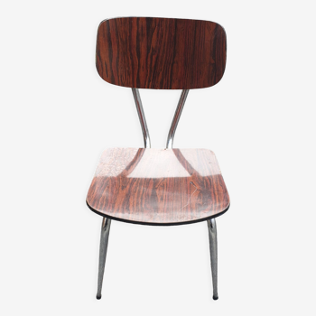 1 veined brown Formica chair