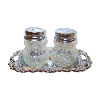 Salt shaker, pepper pot on a silver tray