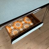 Blue formica table and its 4 chairs