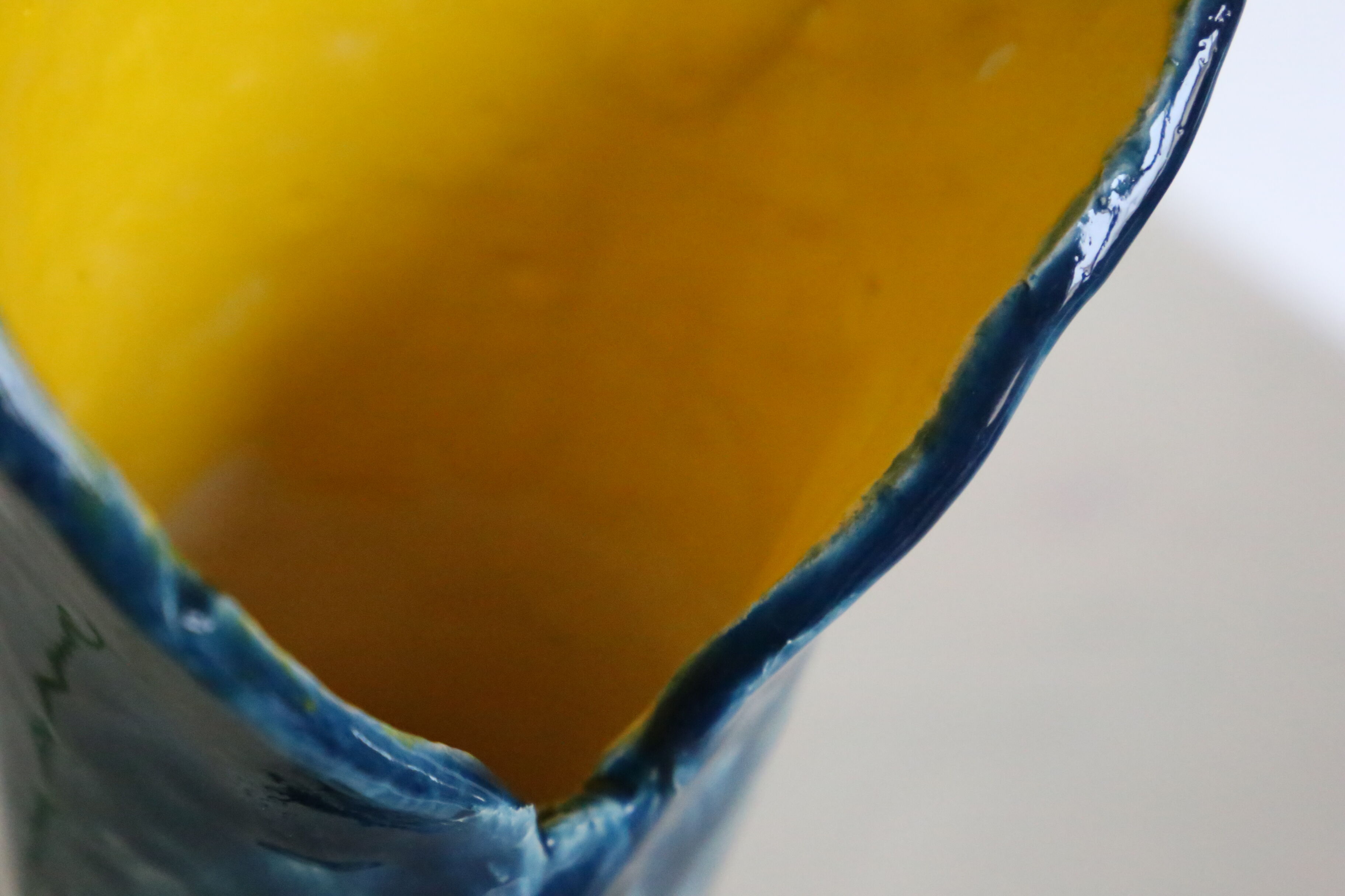 Handmade ceramic vase, glazed blue and yellow, vintage
