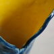Handmade ceramic vase, glazed blue and yellow, vintage