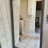 Grand miroir en bois et plâtre