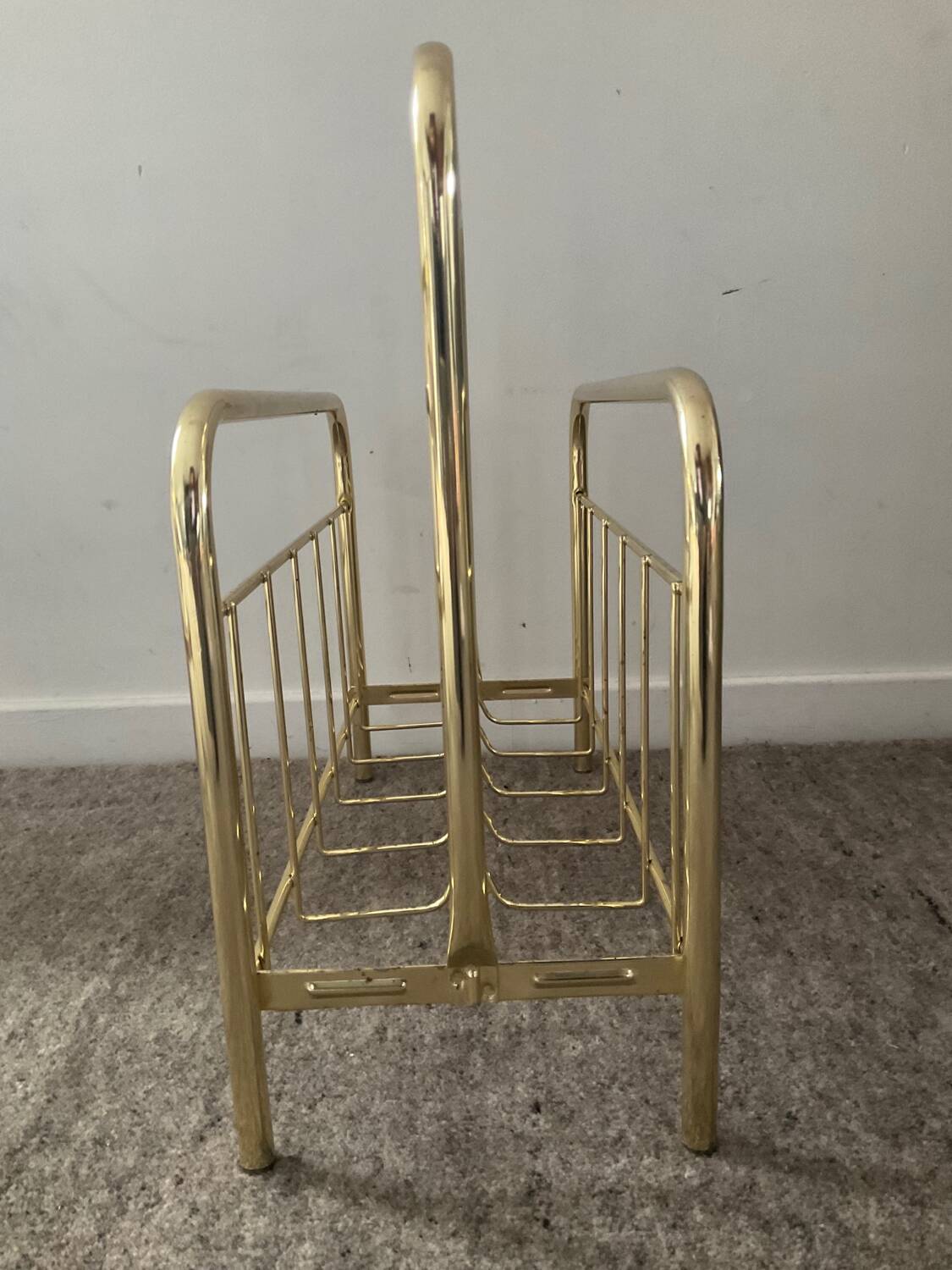 Vintage magazine holder in gold metal