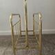 Vintage magazine holder in gold metal
