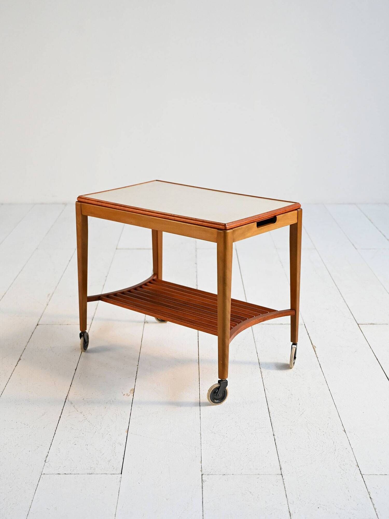Mid-century Northern European serving trolley in teak and birch, 1950s–1960
