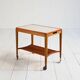 Mid-century Northern European serving trolley in teak and birch, 1950s–1960