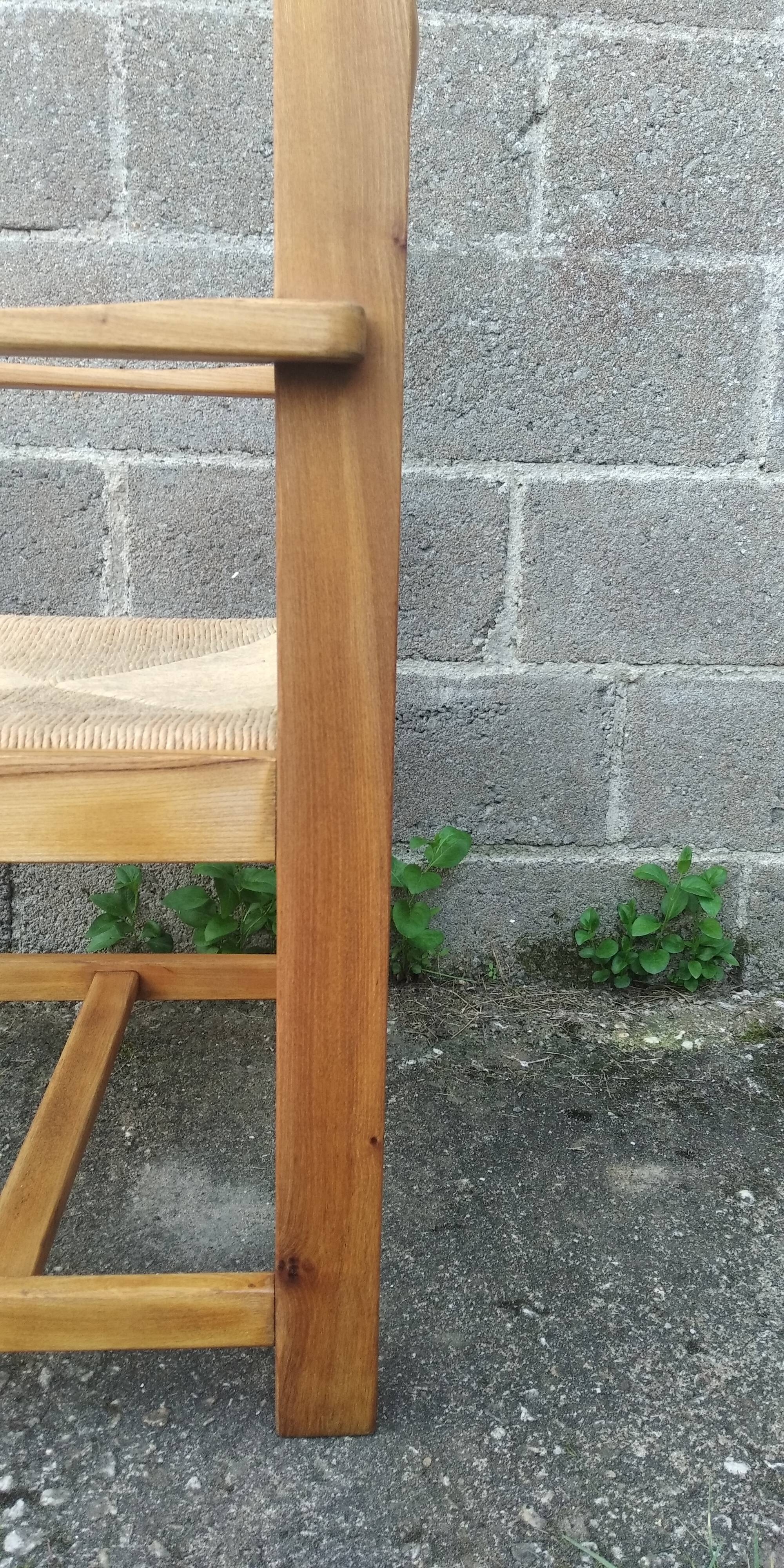Paire de fauteuils années 50 paille et bois