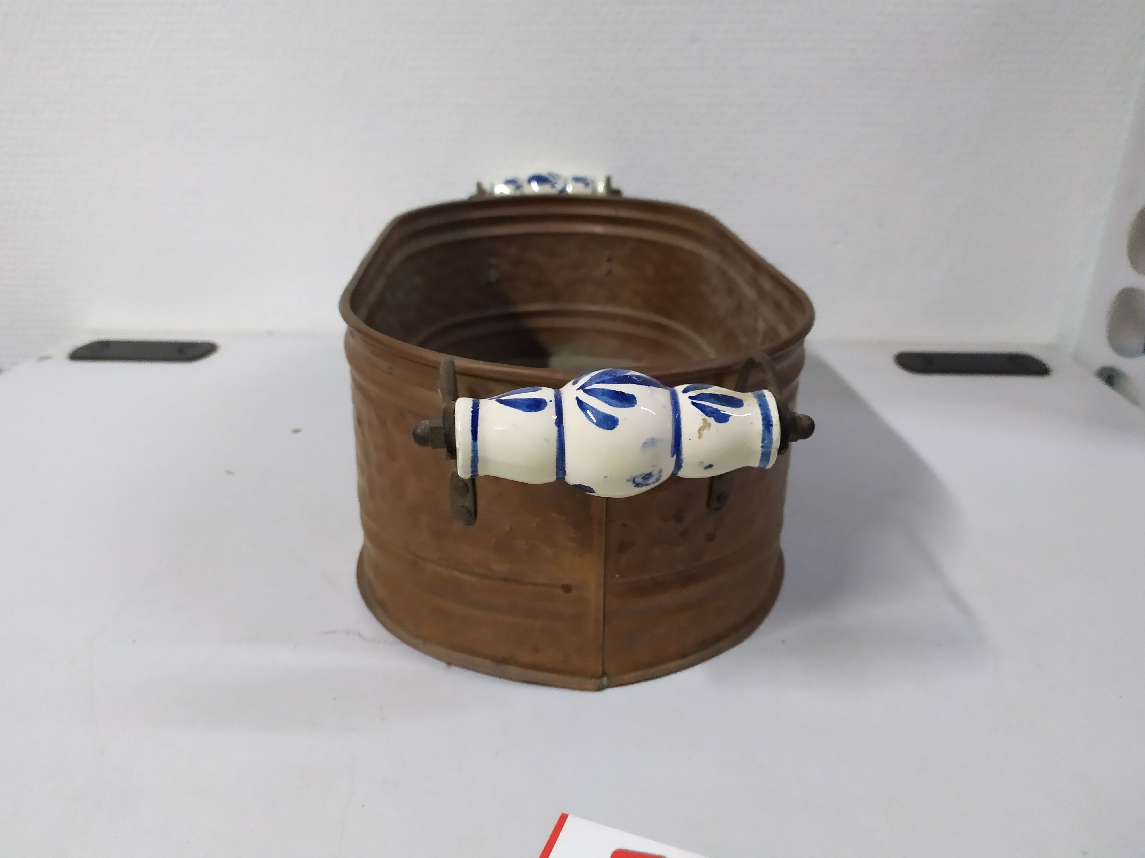 Copper planter with porcelain handles