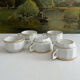 5 vintage porcelain bistro coffee cups from Paris with gold trim.