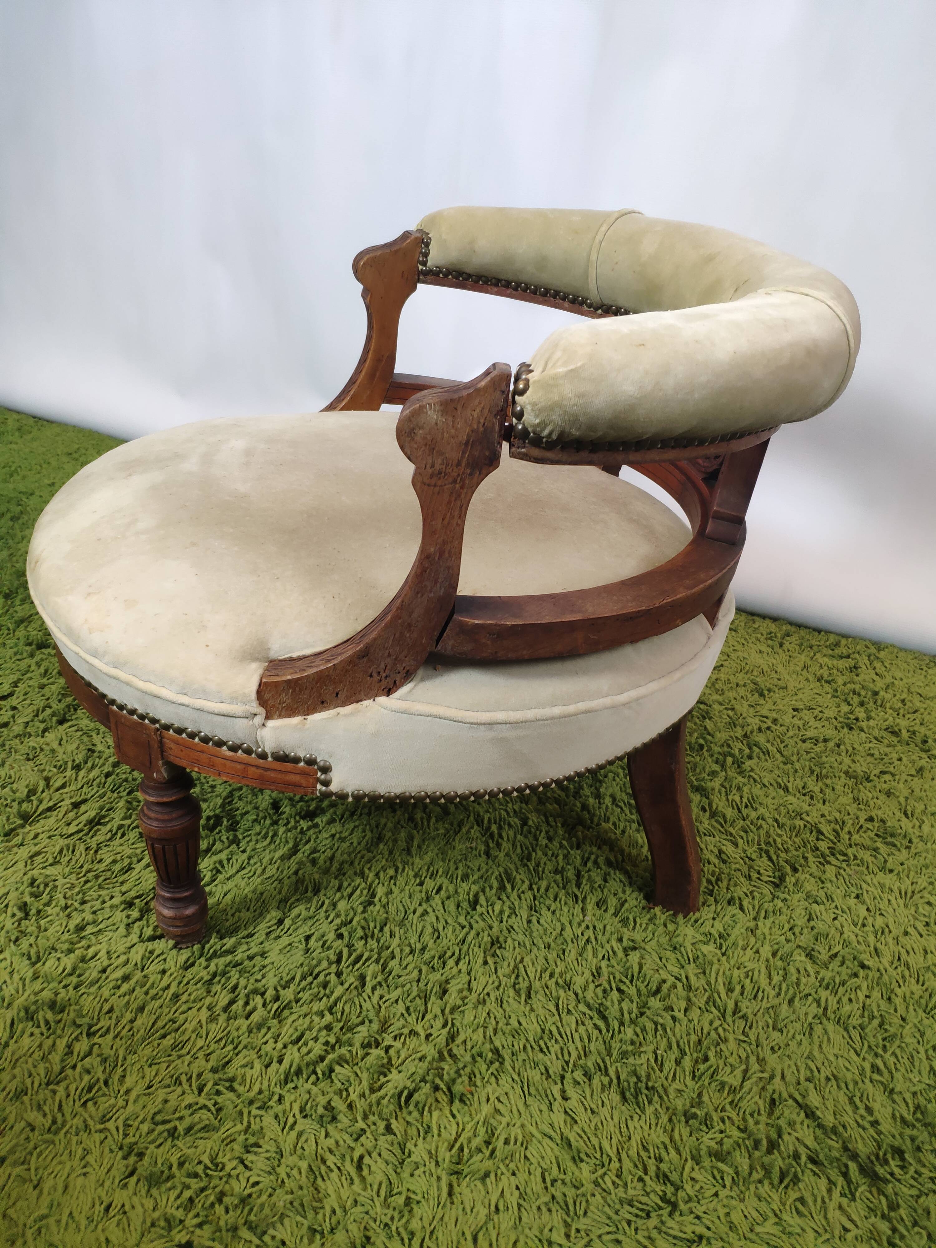 Old green velvet empire chair