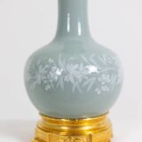 Pair of celadon porcelain and gilt bronze lamps. Circa 1880.