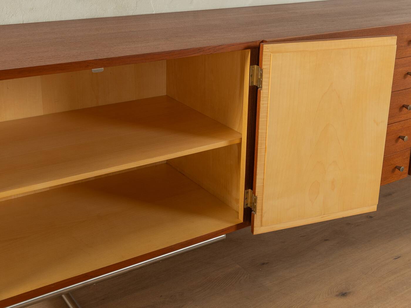 Classic sideboard from the 1960s, teak veneer, black doors, Bauhaus stainless steel feet