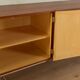 Classic sideboard from the 1960s, teak veneer, black doors, Bauhaus stainless steel feet