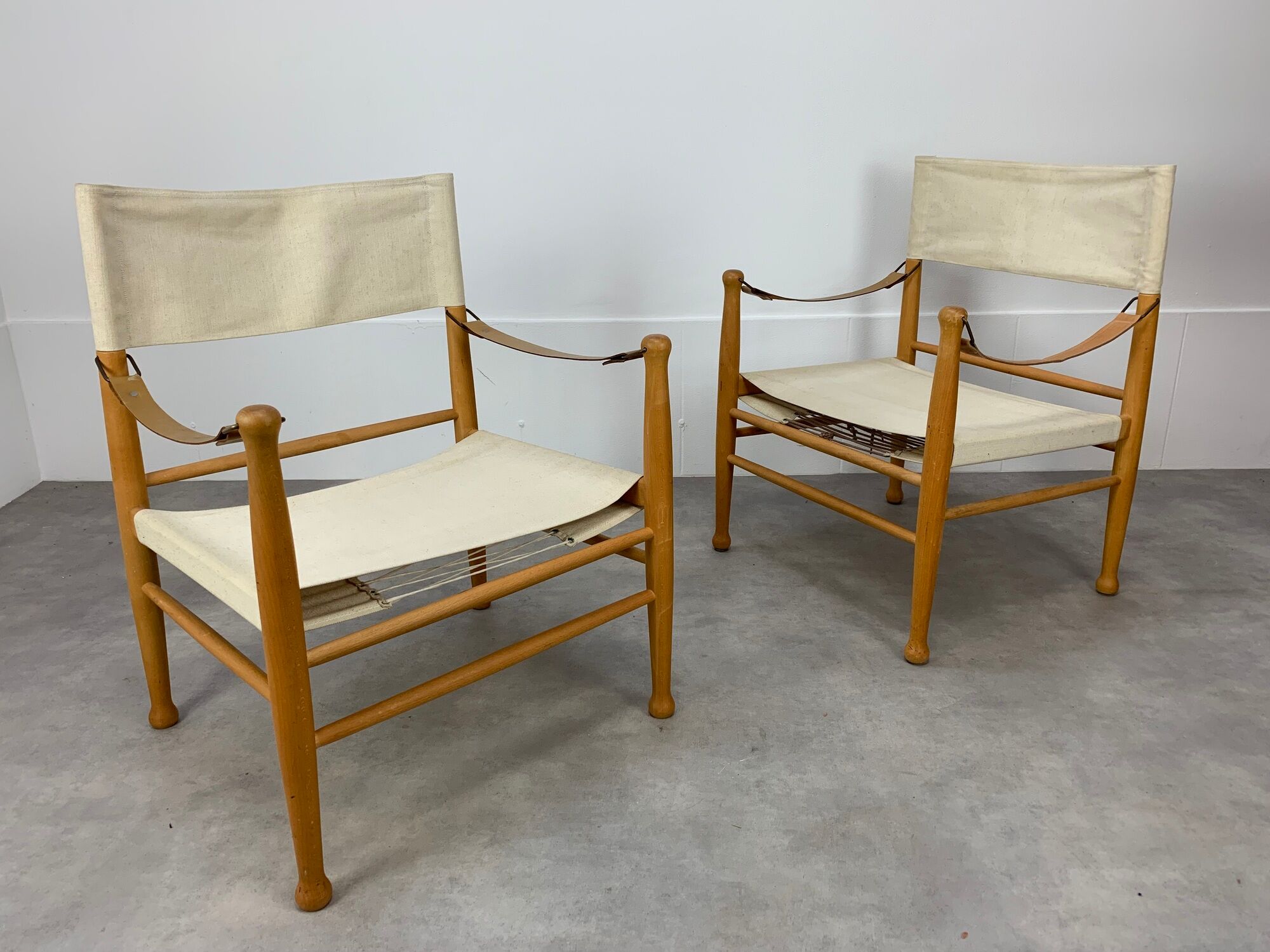 Pair of safari armchairs canvas and leather stretched