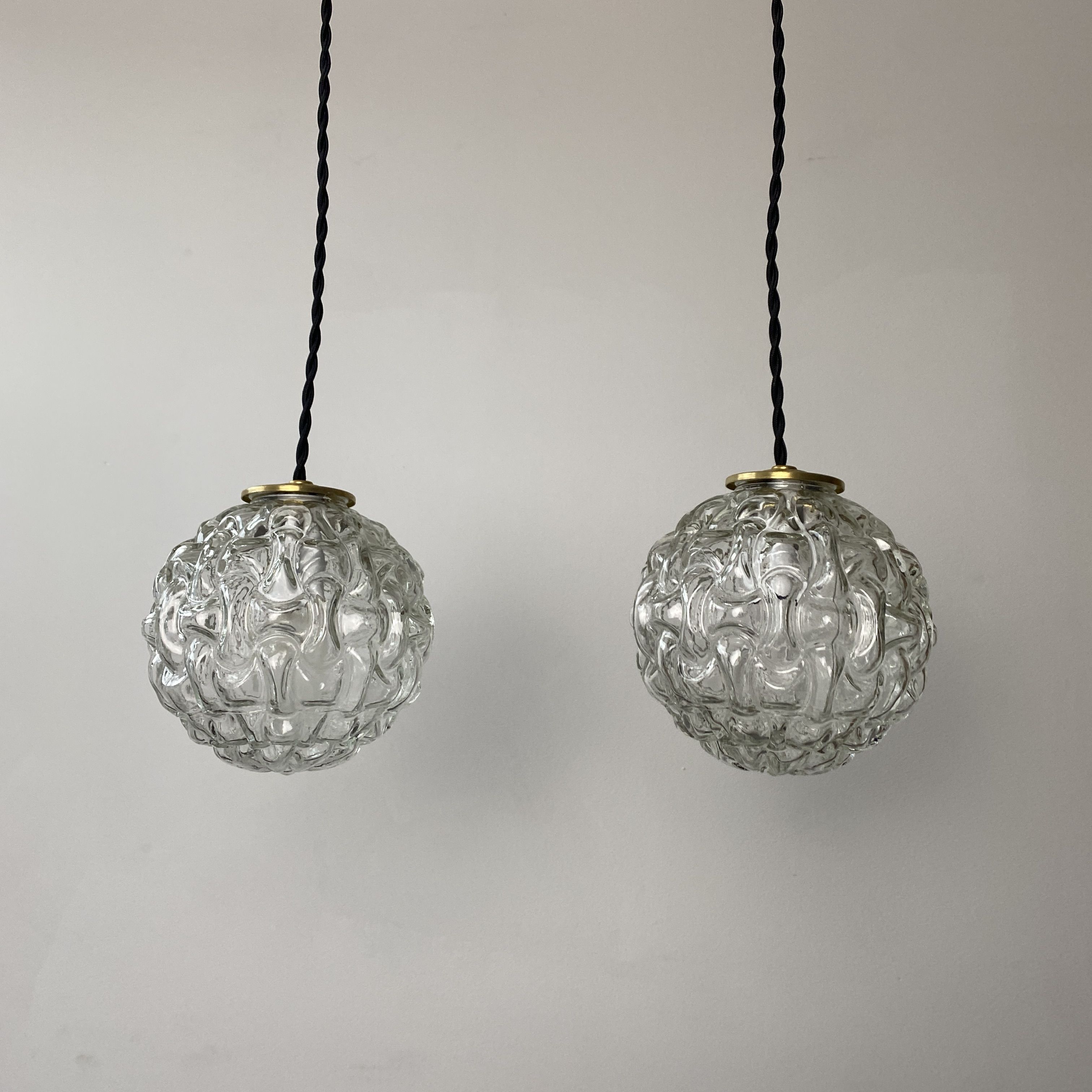 Pair of vintage molded glass round pendant lamps