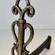 Pair of Brass and Wrought Iron Chenets with Triple Volute and Mount Torch Holders