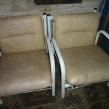 pair of iron armchairs