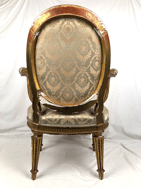 Carved and gilded wooden armchair in Louis XVI style, circa 1900