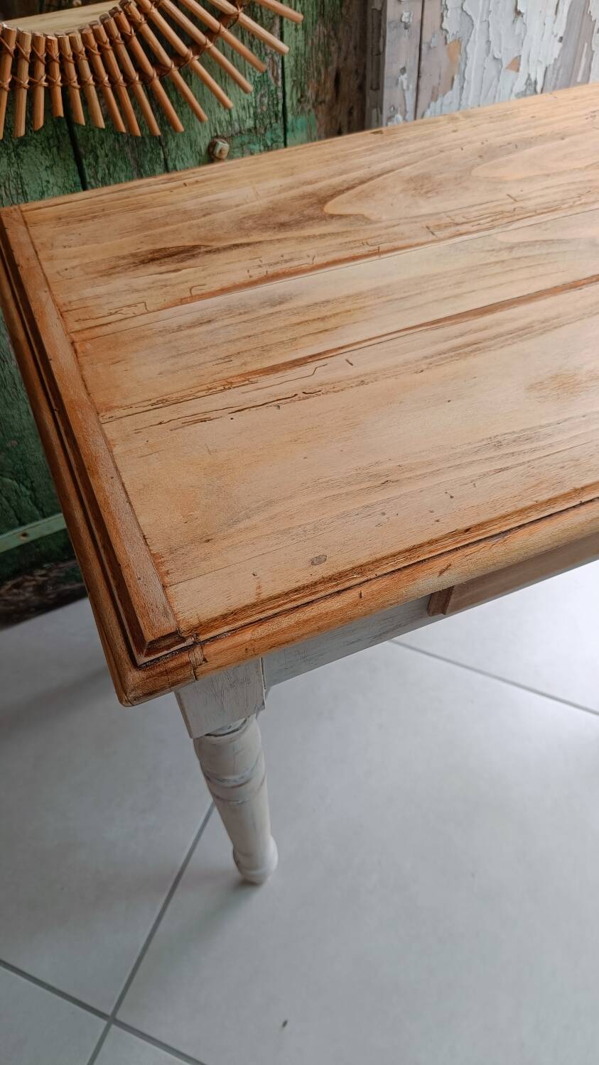 Antique wooden desk with a patinated base