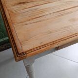 Antique wooden desk with a patinated base