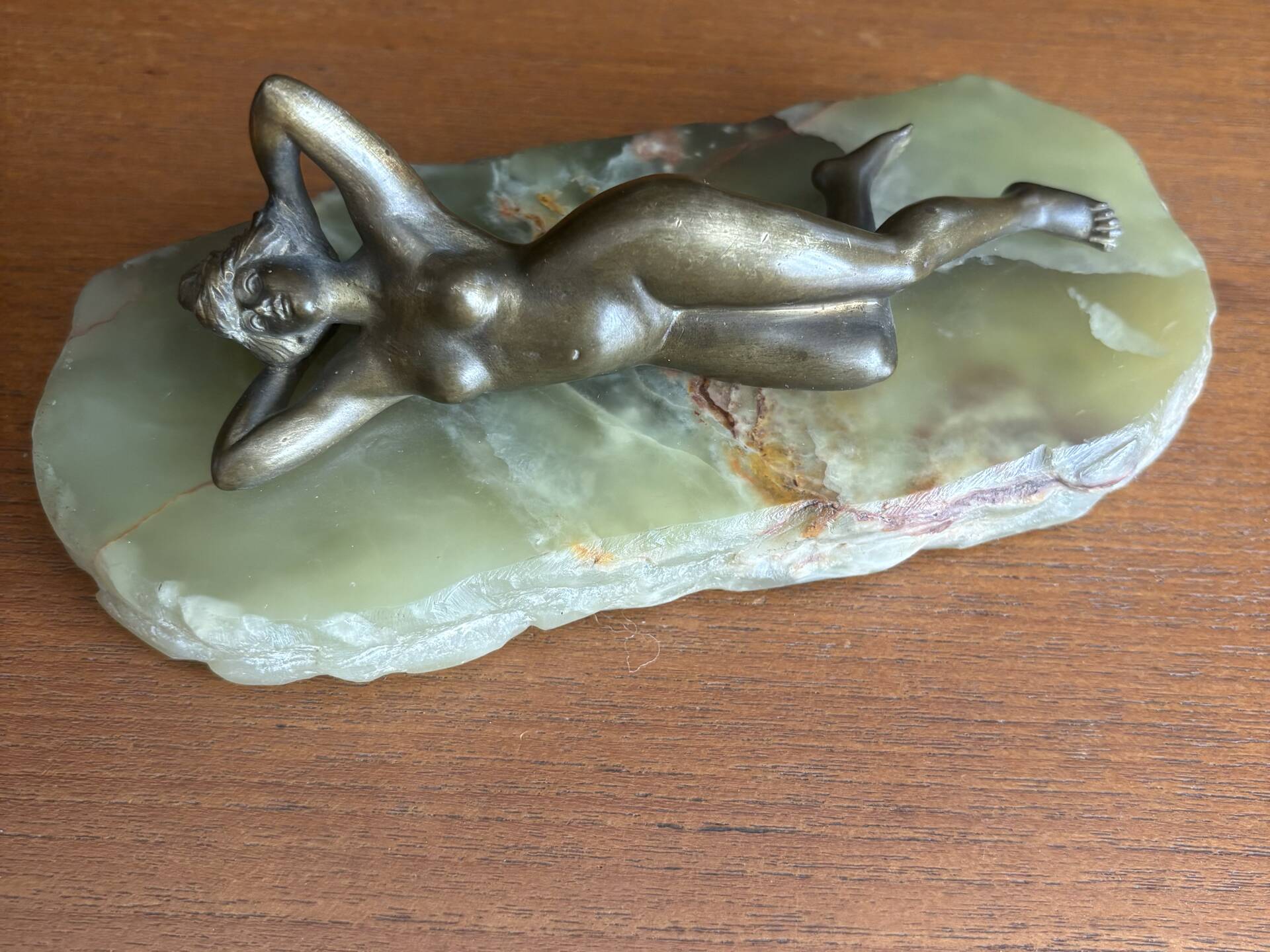 Art Deco female sculpture in bronze with onyx base.