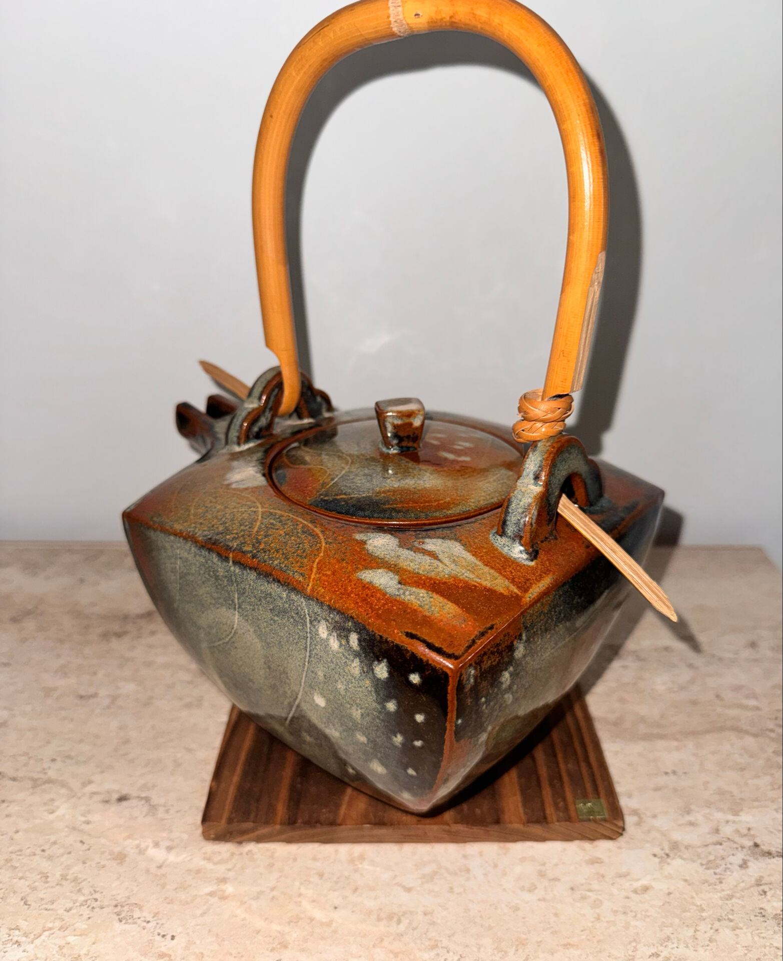 Ceramic teapots with bamboo handles by Elisabeth Wallet