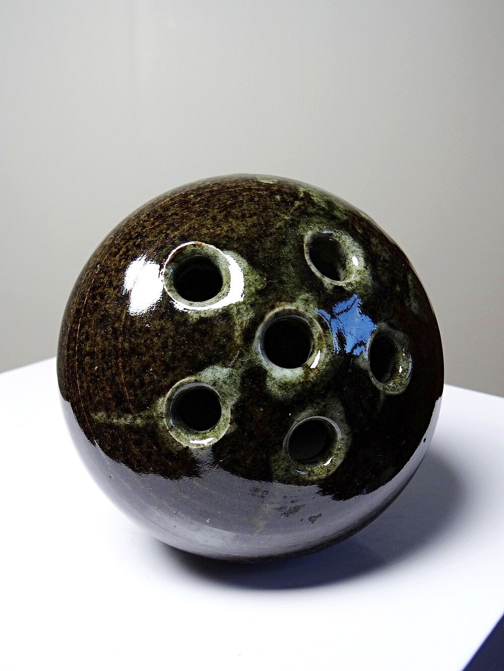 Brown and green glazed stoneware flower holder, vintage craftsmanship from the 1970s-1980s.