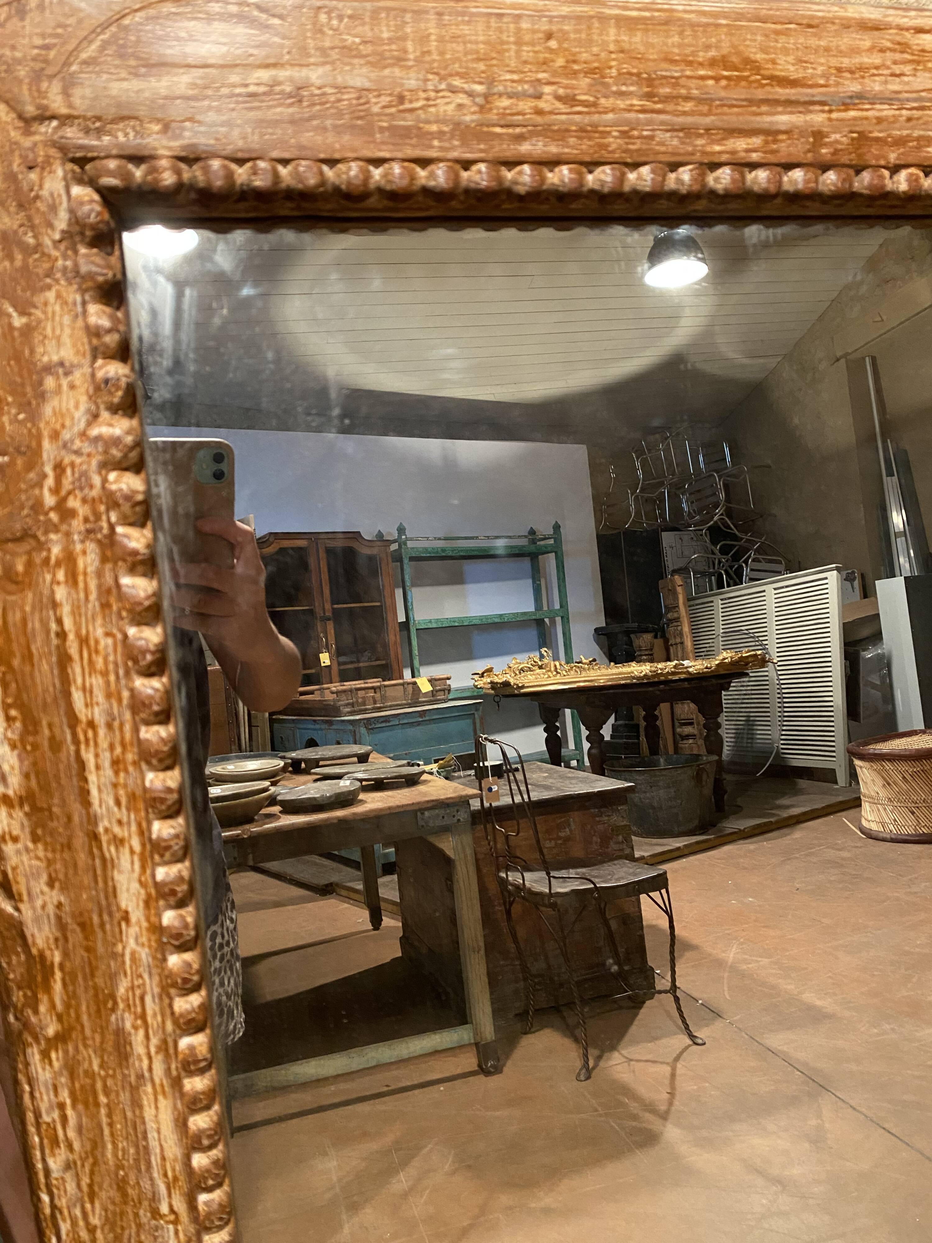 Carved wooden frame mirror